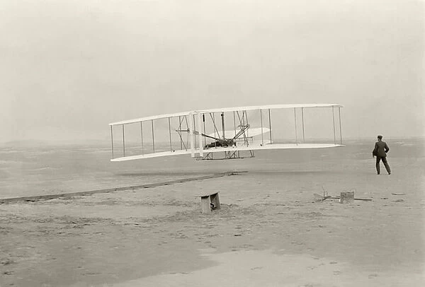 The Wright Flyer I makes its first flight of 120 feet in 12 seconds, at Kitty Hawk, North Carolina, 10. 35am, 17 December 1903 (b  /  w photo)