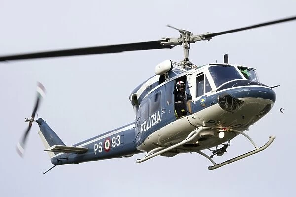 An Agusta Bell 212 of Italys State Police in flight over Italy