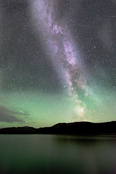 Aurora borealis and Milky Way above Fish Lake, Yukon, Canada