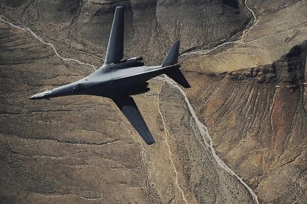 A B-1B Lancer maneuvers over New Mexico during a training mission