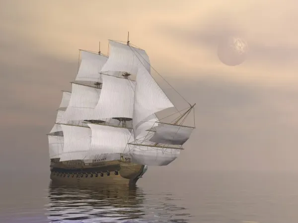 Beautiful old merchant ship sailing on quiet waters under