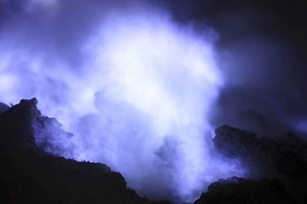 Burning sulphur on Kawah Ijen Volcano, Java, Indonesia