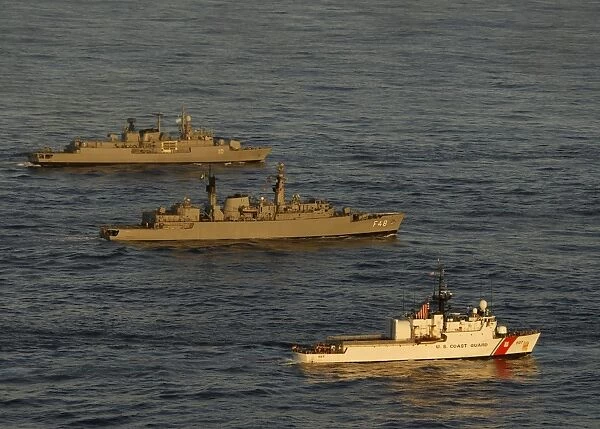 A convoy of naval ships move into formation during UNITAS 52 in the Atlantic Ocean
