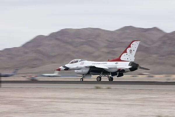 An F-16C Thunderbird sits on the runway at Nellis Air Force Base, Nevada