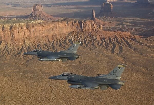 Two F-16s fly in formation over Northern Arizona