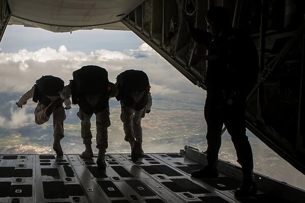 Paratroopers jump out of a KC-130J aircraft over Spain