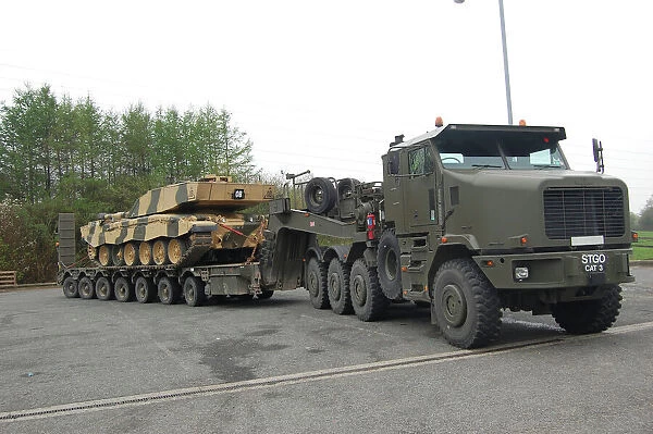 A tank transporter hauling a Challenger 2 main battle tank to Wales for an exercise