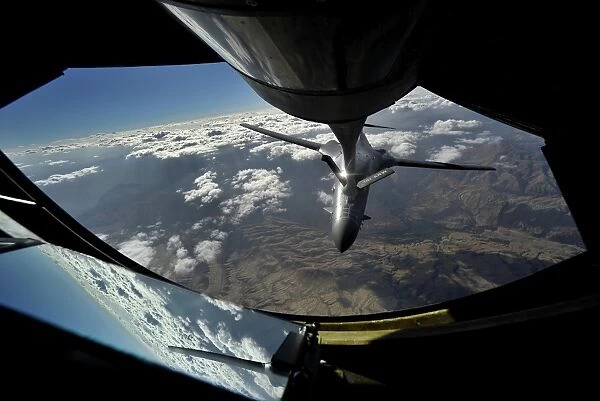 A U.S. Air Force B-1B Lancer is refueled over Afghanistan
