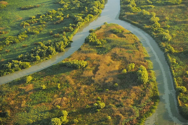 Aerial view over the Danube delta rewilding area, showing various waterways, Romania