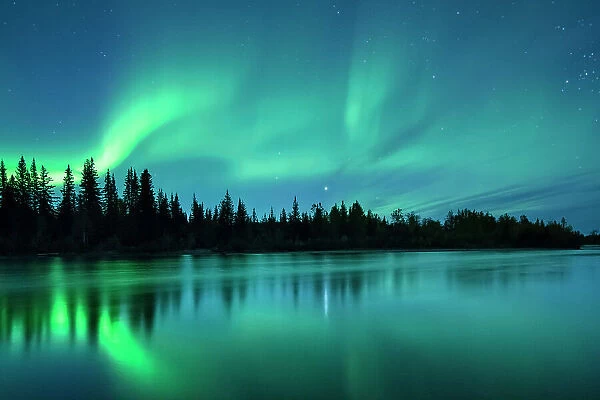 Aurora Borealis (Northern Lights) over the Klondike River, Yukon Territories, Canada