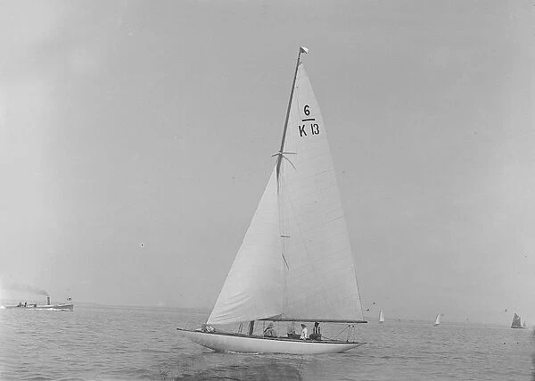The 6 Metre Flya (K13) sailing close-hauled, 1921. Creator: Kirk & Sons of Cowes
