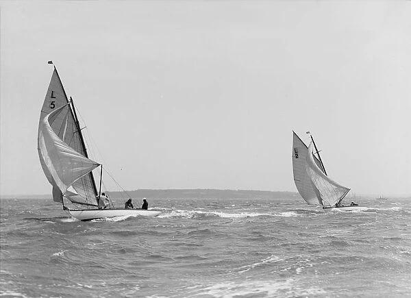 The 6 Metre Snowdrop and Correnzia racing downwind, 1911. Creator: Kirk & Sons of Cowes