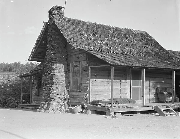 House occupied by sharecropper family for seven years, Near Hartwell, Georgia, 1937. Creator: Dorothea Lange