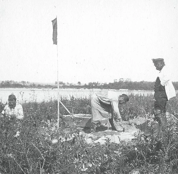 The moment of laying the benchmark on the river bank, 1909. Creator: Vladimir Ivanovich Fedorov