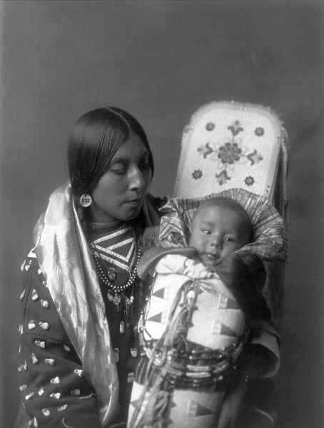 Mother and child-Apsaroke, c1908. Creator: Edward Sheriff Curtis