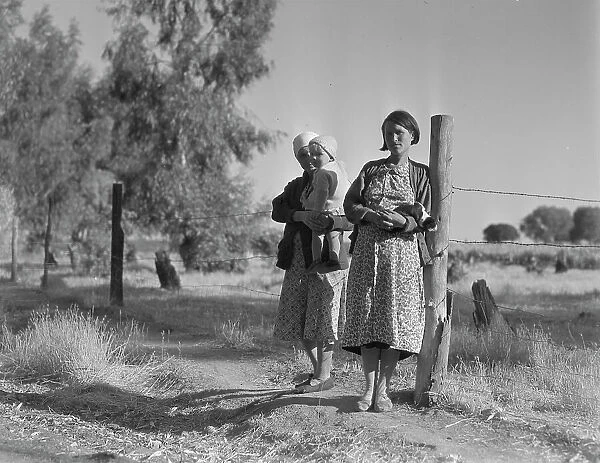 Pregnant migrant woman... squatter camp, Kern County, 1936. Creator: Dorothea Lange