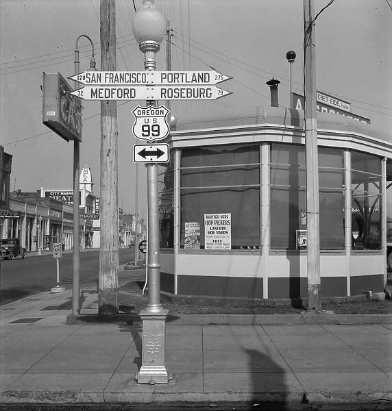 Sign of service station, U. S. 99, Josephine County, Oregon, 1939. Creator: Dorothea Lange