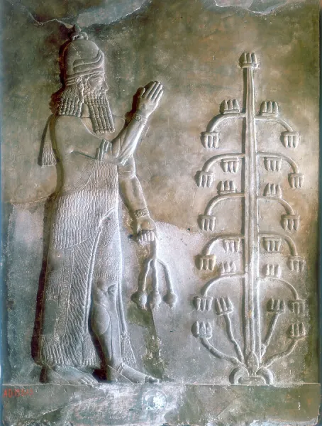 Stone relief of Sargon I standing before a tree of life, 24th-23rd century BC