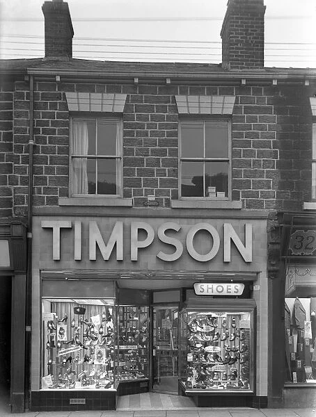Timpsons shoe shop window, Mexborough, South Yorkshire, 1956. Artist: Michael Walters