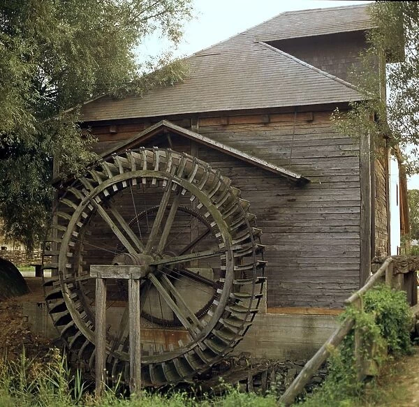 Waterwheel for a mill in Hungary. Artist: CM Dixon