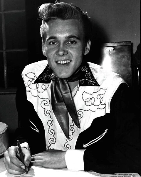 Billy Fury 1958. Billy Fury, Rock & Roll singer, signing a contract for Decca Records