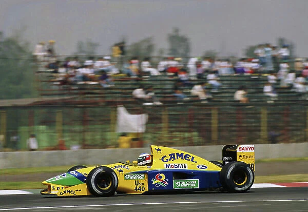 1992 Mexican Grand Prix. Mexico City, Mexico. 20th - 22nd March 1992. Michael Schumacher (Benetton B191B-Ford), 3rd position, action. World Copyright: LAT Photographic. Ref: 92 MEX 15