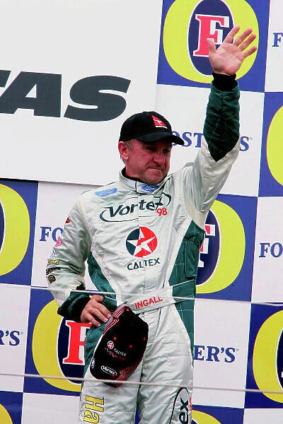 2005 Australian V8 Supercars Albert Park, Melbourne, Australia. 4th - 6th March. Russell Ingall celebrates on the podium after race 3. Portrait. World Copyright: Mark Horsburgh / LAT Photographic ref: Digital Image Only