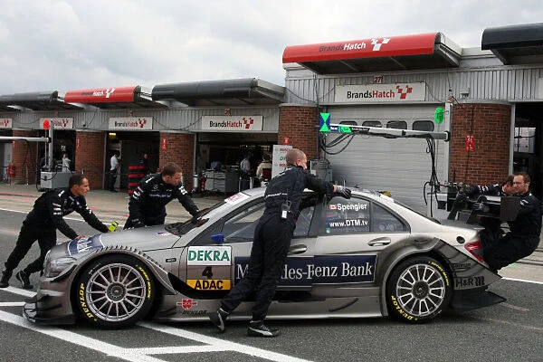 DTM mechanics with the car of Bruno Spengler 