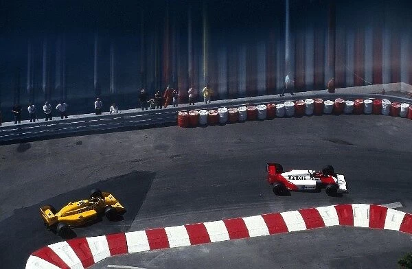 Formula One World Championship: Alain Prost Mclaren MP4  /  3, 9th place, leads race winner Ayrton Senna Lotus 99t