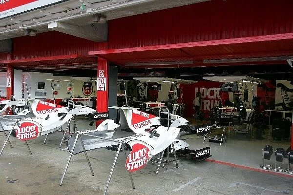 Formula One World Championship: The BAR team prepare the cars in the garages before the announcement of their 2 race ban