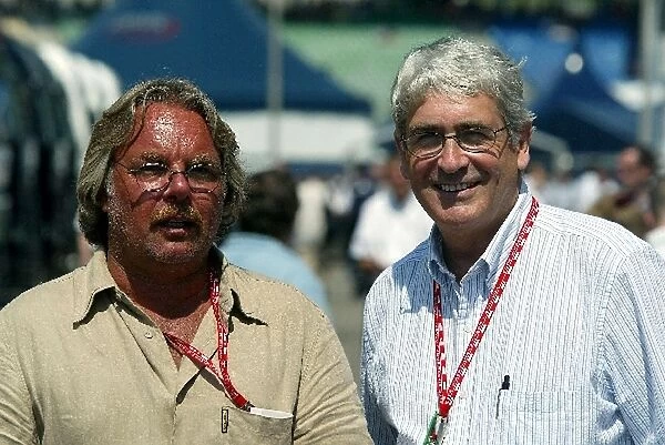 Formula One World Championship: Keke Rosberg Manager of Olivier Panis Toyota with Mike Dooson F1 Journalist