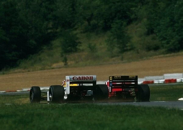 Formula One World Championship: Nelson Piquet Williams FW11B and Gerhard Berger Ferrari F1  /  87 slog it out