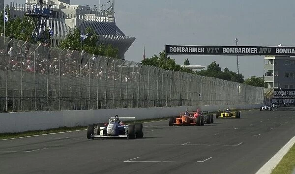 With one lap to go eventual second place finisher Jon Fogarty leads eventual winner Rocky Moran at the Toyota Atlantic race at the Molson Indy Montreal. Circuit Gilles Villeneuve, Montreal, Quebec, Can. 24