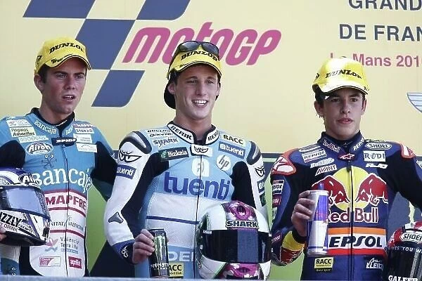 MotoGP. 125cc podium and results:. 1st Pol Espargaro (ESP), Tuenti Racing, centre.