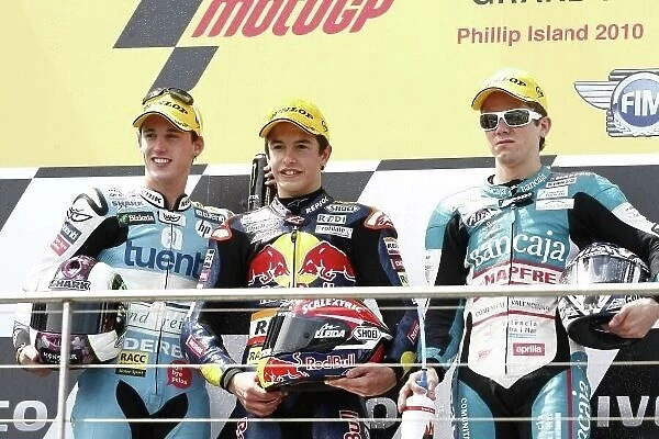MotoGP. 125cc podium and results:. 1st Marc Marquez (ESP), Derbi, centre.