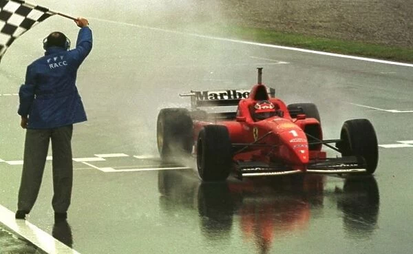 SP11. JPG. Spanish Grand Prix 1996. Michael Schumcaher take sthe chequered flag