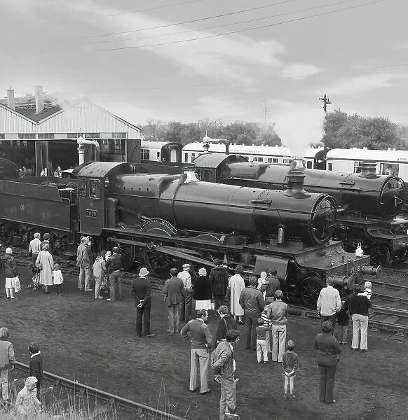 People viewing the 7808 Cookham Manor, a Great Western Railway 7800 Manor Class steam locomotive. It was built in 1938 at Swindon Works; England