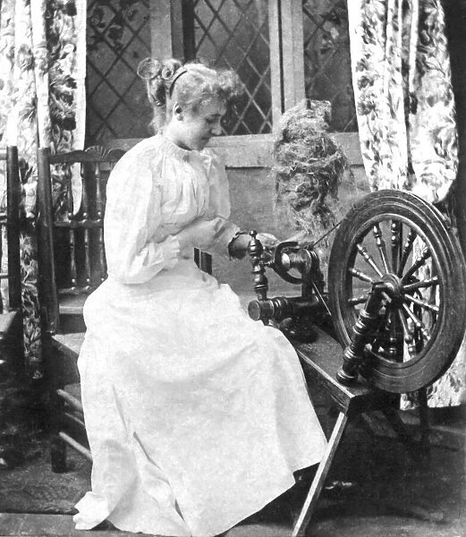 Spinster with spinning wheel