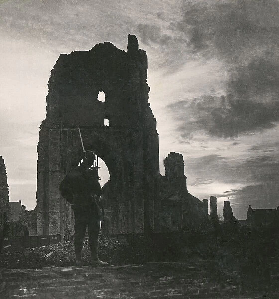 Stereoview, World War One, The Great War, Realistic Travels military photographs circa 1918. Guarding sacred Ypres, where British herosim shone resplendent through the wars darkest hours. Soldier standing in ruined cathedral