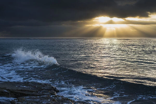 Surf Breaks At Sunrise; Wailua, Kauai, Hawaii, United States Of America