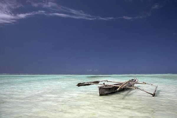 Zanzibar, Tanzania; Dhow In Shallow Water
