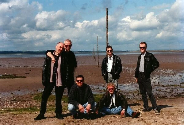 The 1996 line-up of the pop group Lindisfarne, pictured here on Holy Island (Lindisfarne)