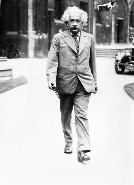 Albert Einstein Professor walking in the College Quadrangle. 1933