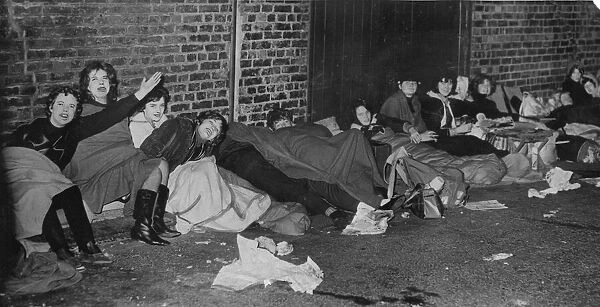 The all-night Beatle vigil. Transistor radios keep the pop hungry fans going through