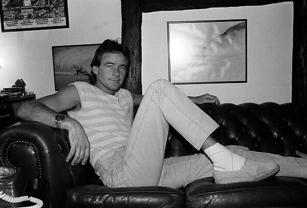 Barry Sheene rests at home after breaking his ankle, May 1985
