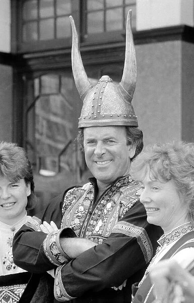 BBC television chat show host Terry Wogan wearing a Viking helmet May 1986