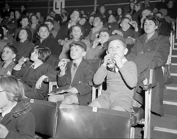 Bertram Mills Circus Audience Dec 1952 Children cover their faces with their food