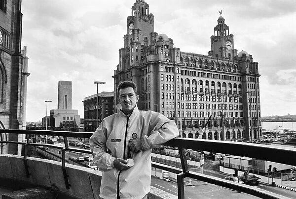 British cyclist Chris Boardman poses in front of the Royal Liver Building in Liverpool