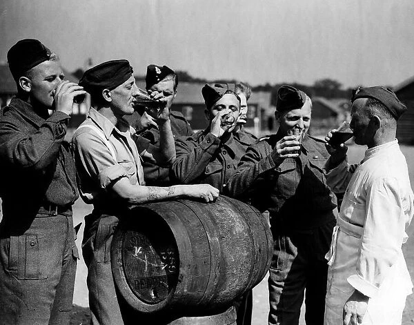 British troops released from a German prison camp 1944 drinking English beer for