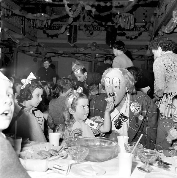 A clown at a childrens party. December 1953 D7572